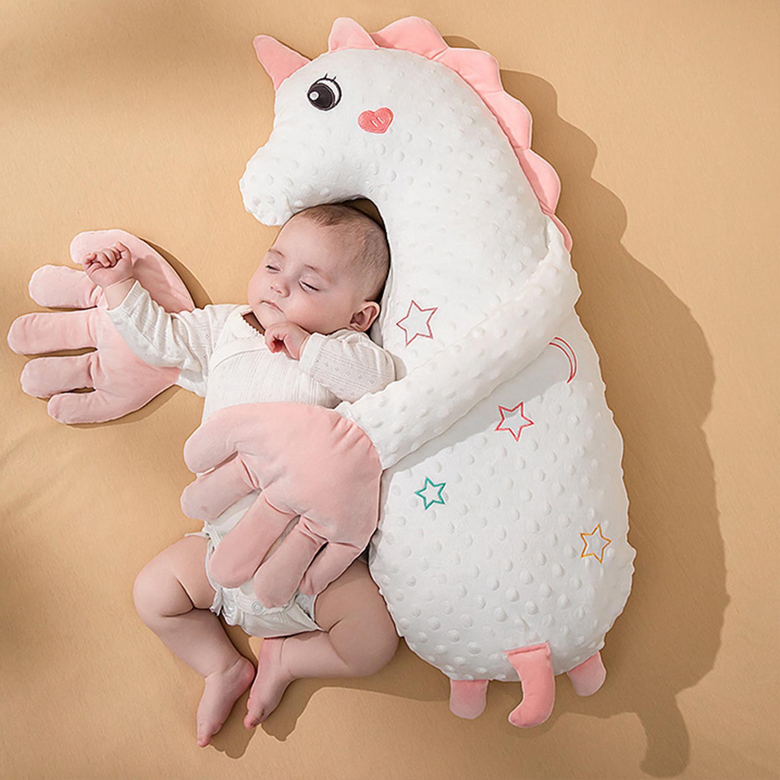 Baby Nursery Boy - 新生児用の赤ちゃん枕。心地よい感触のパーム型リモコン付き。電動で手を撫でるように振動し、赤ちゃんを安心させる。